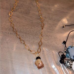 Pretty brown stone with gold plated necklace